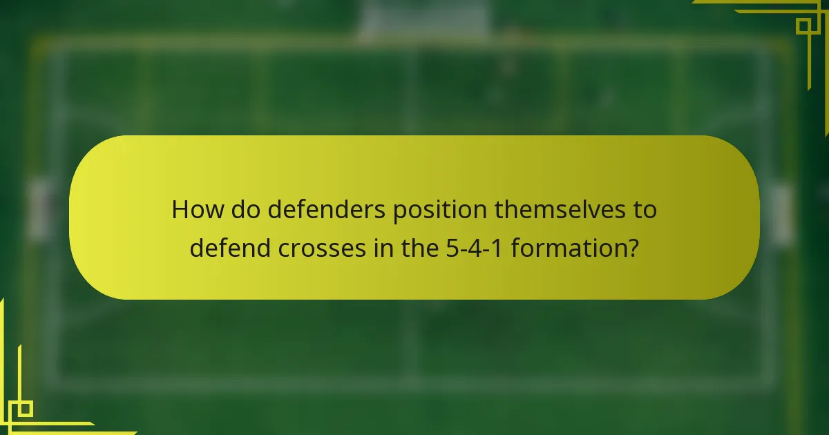How do defenders position themselves to defend crosses in the 5-4-1 formation?