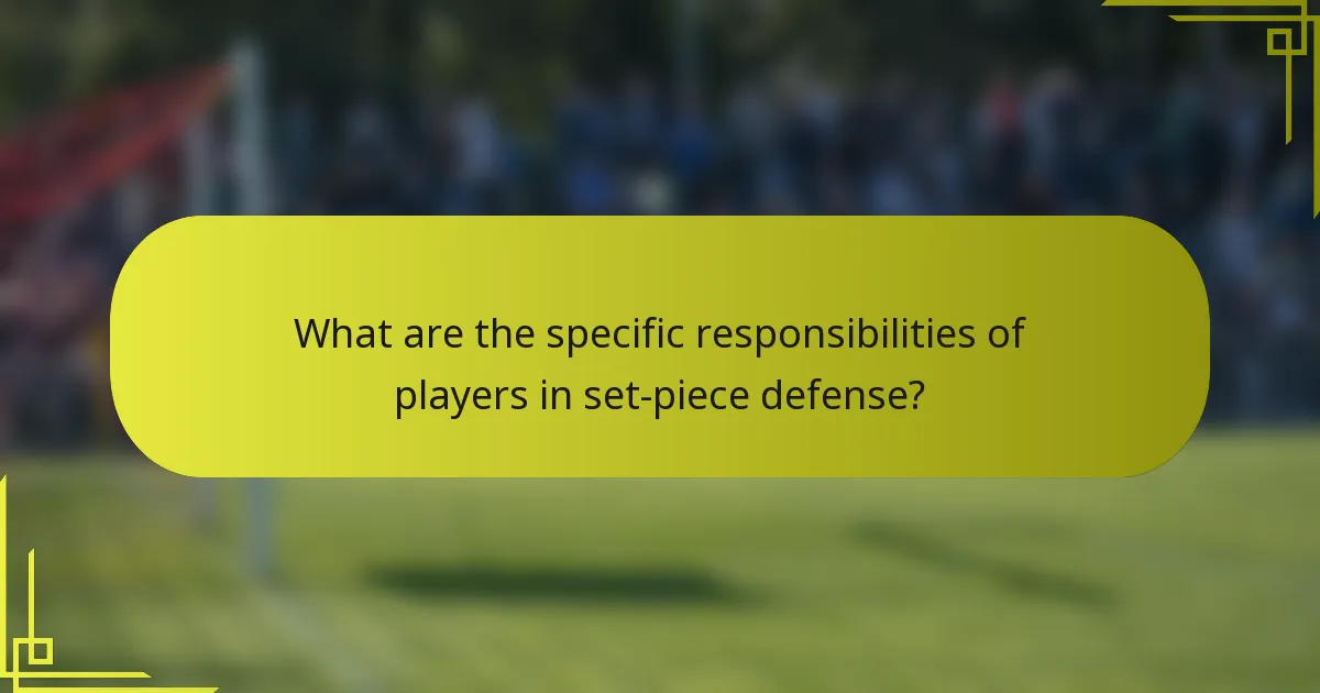 What are the specific responsibilities of players in set-piece defense?